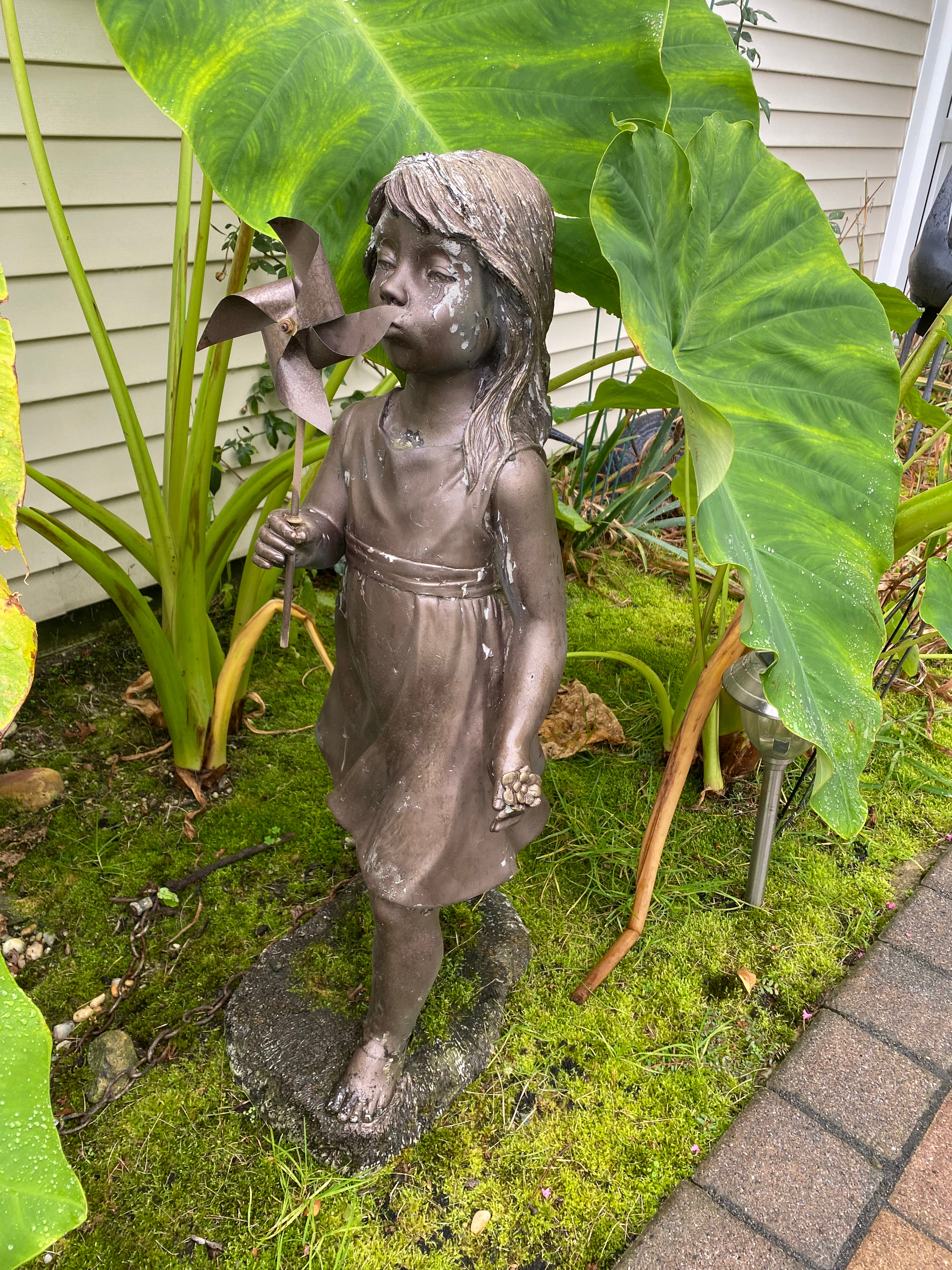 Girl Statue w/ Windmill before